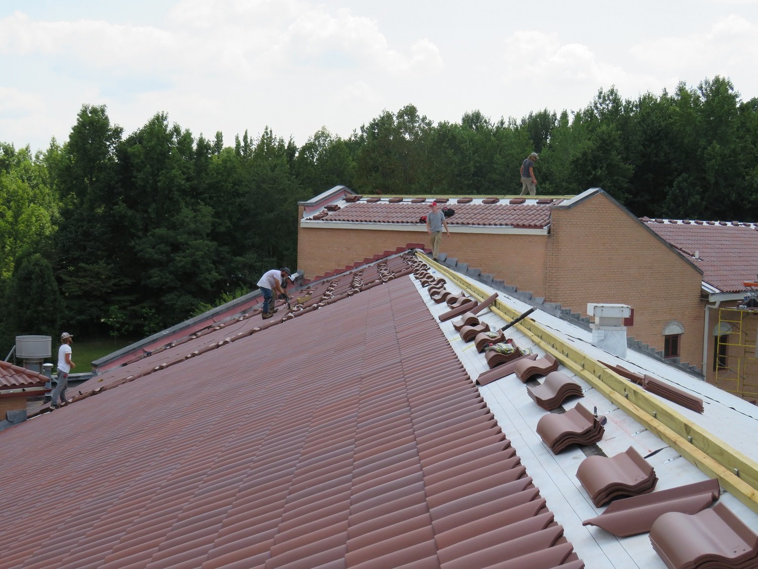  August 5 - it’s really starting to look like a clay tile roof 