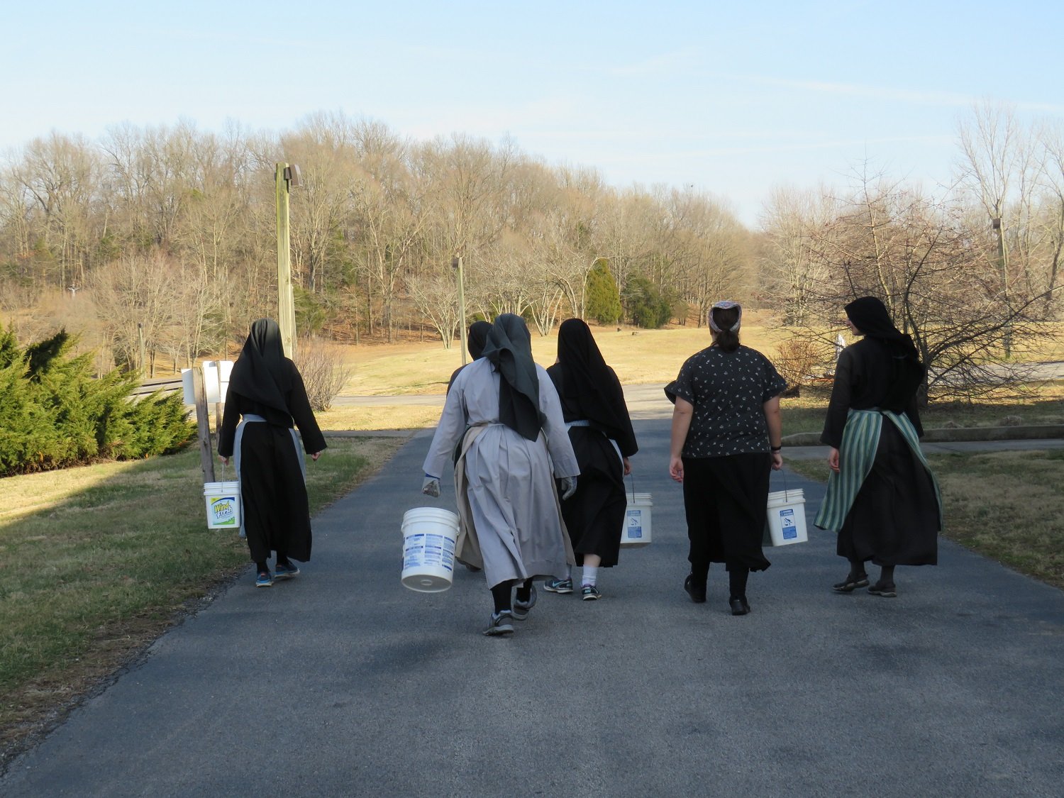  Five nuns (and an aspirant!) on a mission: clean up the property and have fun doing it! 