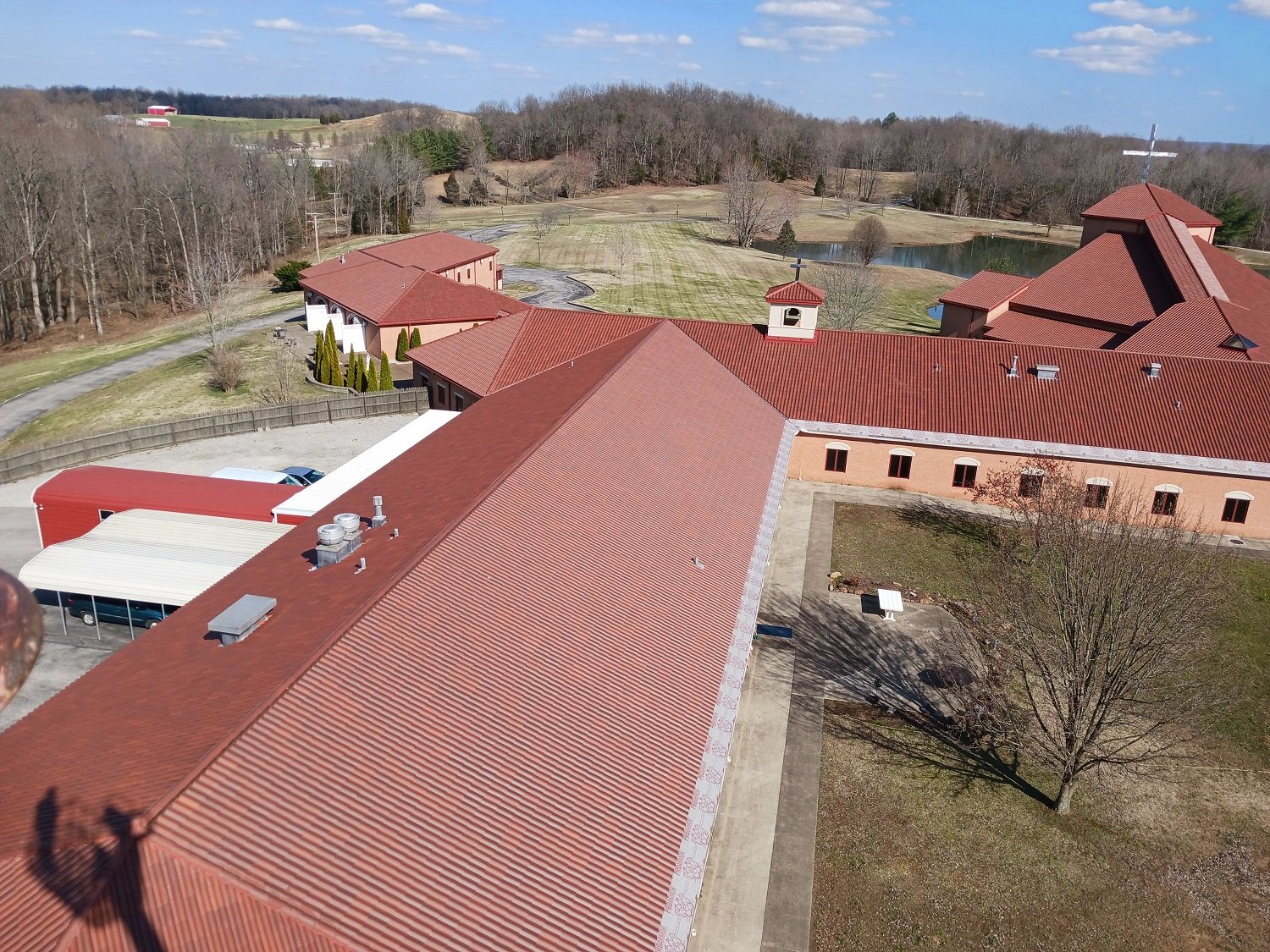 March 10 - The completed work wing roof, with Retreat House and chapel visible in background
