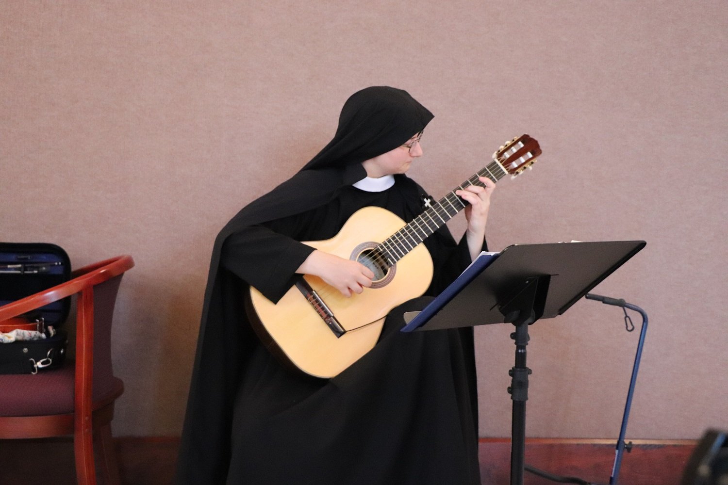  Sr. Miriam Esther played a prelude on classical guitar  