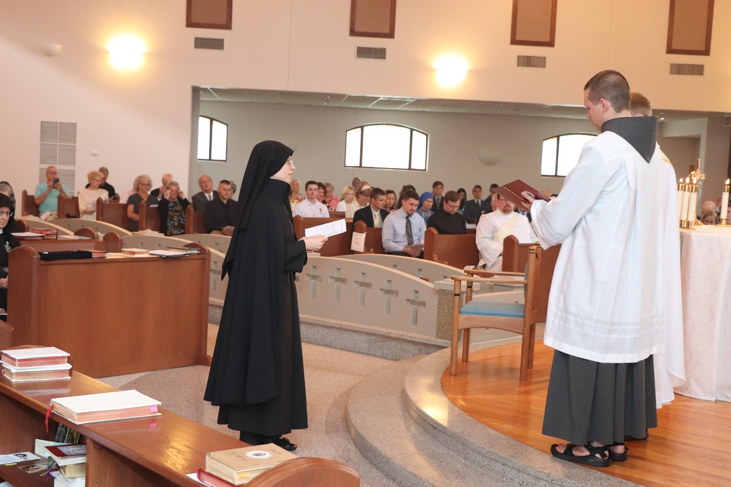  The rite of calling: before the homily, Fr. Tony Hollowell (the main celebrant), in the name of the Church, formally calls Sr. Frances Marie to express her intention to make perpetual vows 