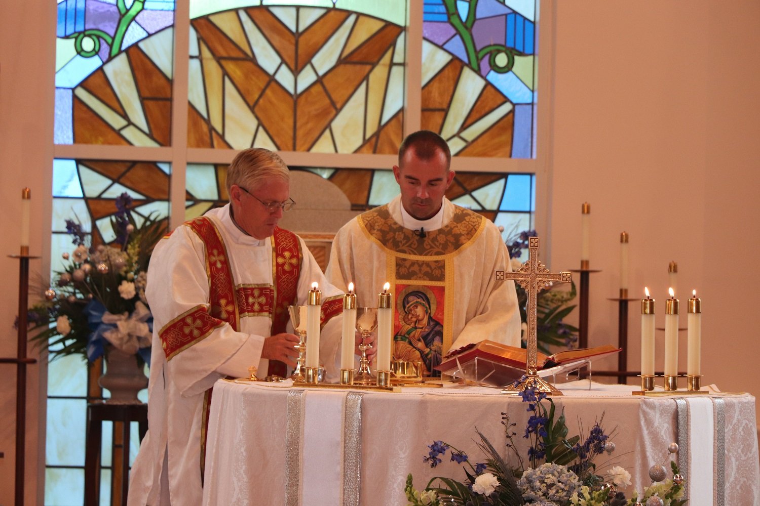  Fr. Jeff and Dcn Bruce prepare the altar for the Holy Sacrifice 