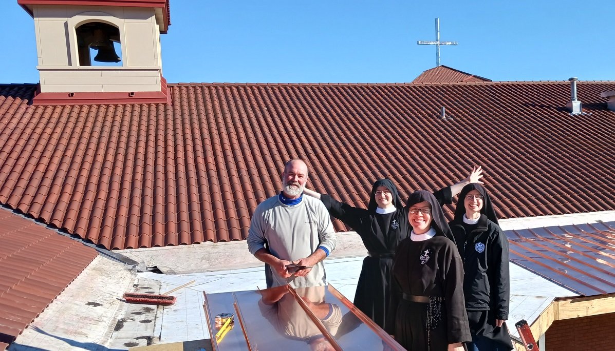  In late November, Kyle Cook (Helming Bros roofing crew) offered a “roof tour” to some of our more intrepid Sisters 