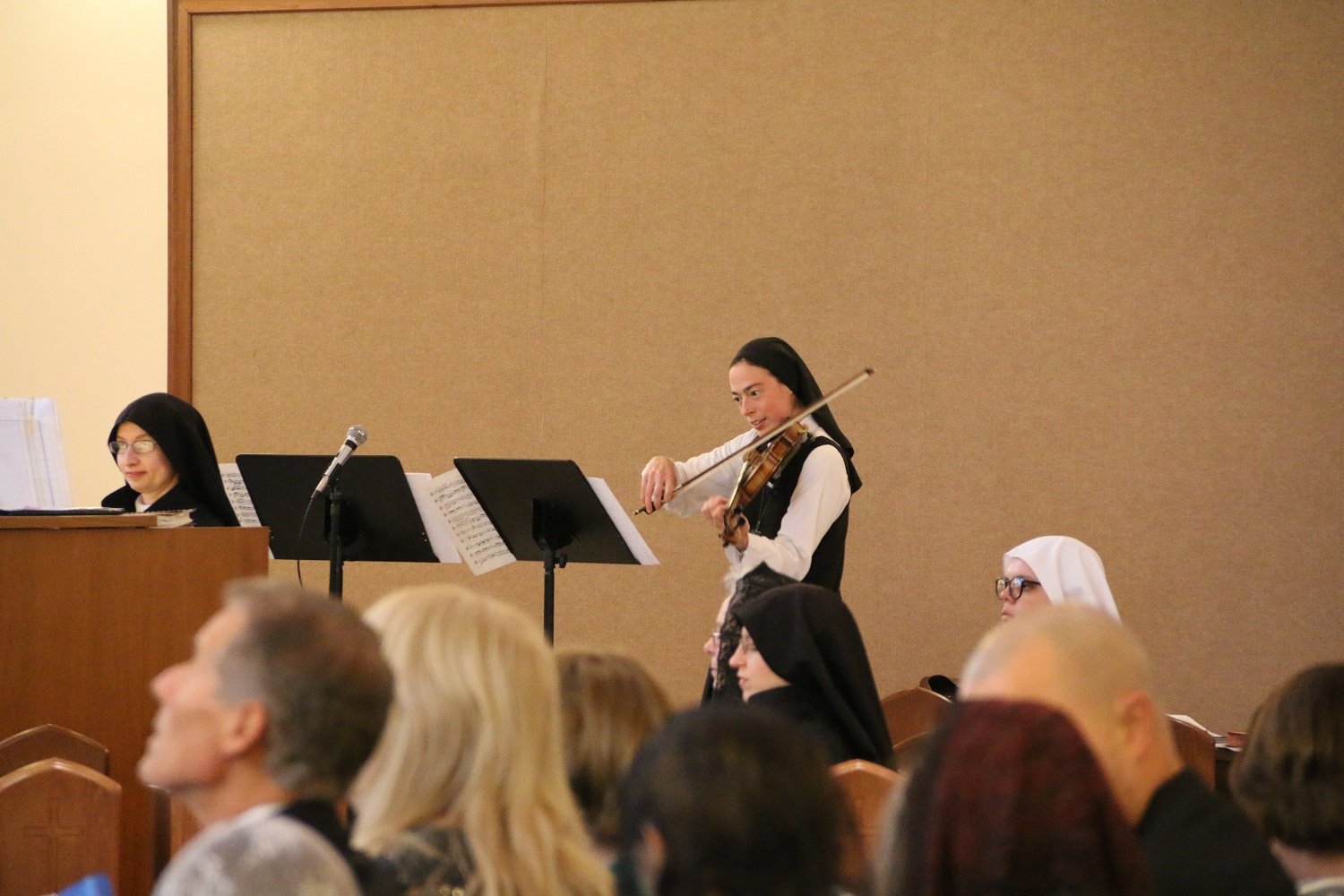  Sr. Cecilia Maria and (retro) Postulant Holly played beautiful organ and violin preludes: Bach’s “Sleepers Awake” and an arrangement of “Veni Creator Spiritus.”   (Photo: Elizabeth Wong Barnstead, Western KY Catholic)  