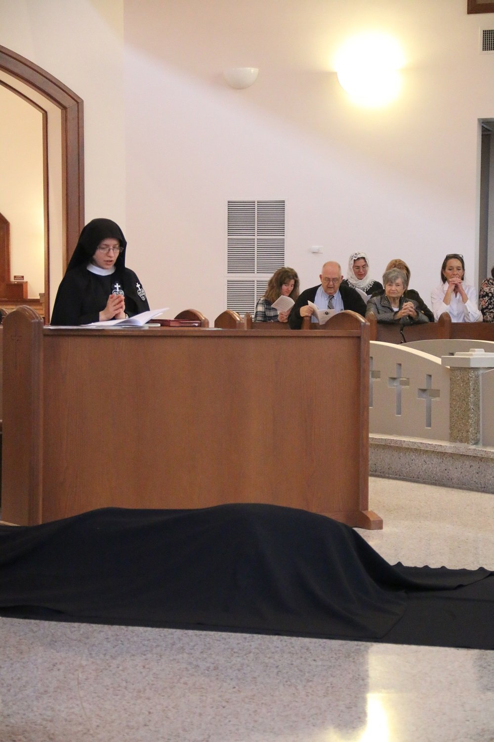  Sr. Frances Marie, who made her own Perpetual Vows last year, praying for her Sister in formation.   (Photo: Elizabeth Wong Barnstead, Western KY Catholic)  