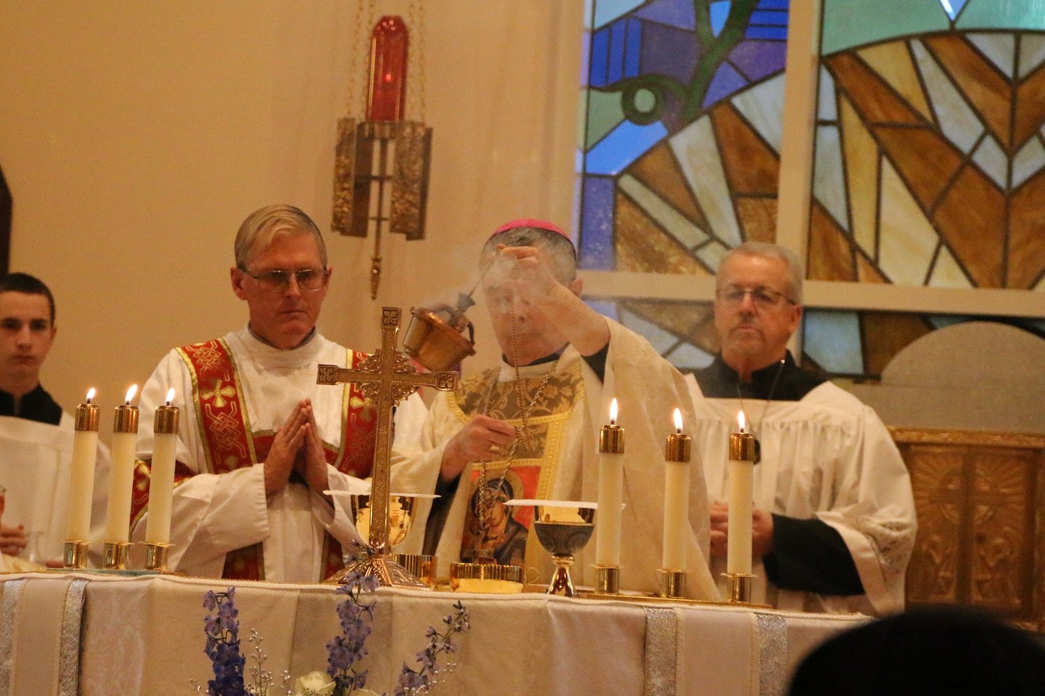  Incensing the gifts before the Eucharistic Prayer begins   (Photo: Elizabeth Wong Barnstead, Western KY Catholic)  