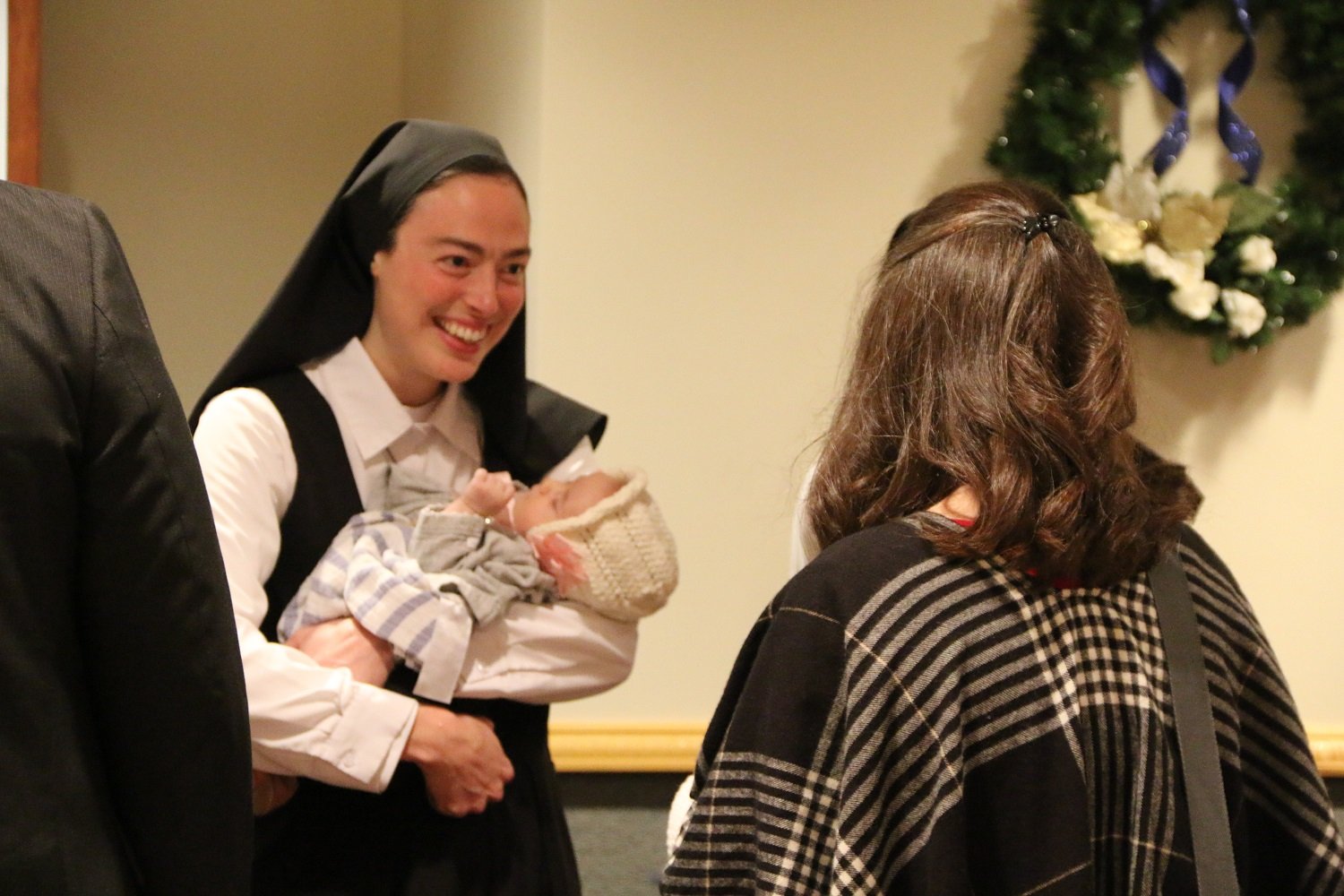  Babies are always the most popular visitors!   (Photo: Elizabeth Wong Barnstead, Western KY Catholic)  