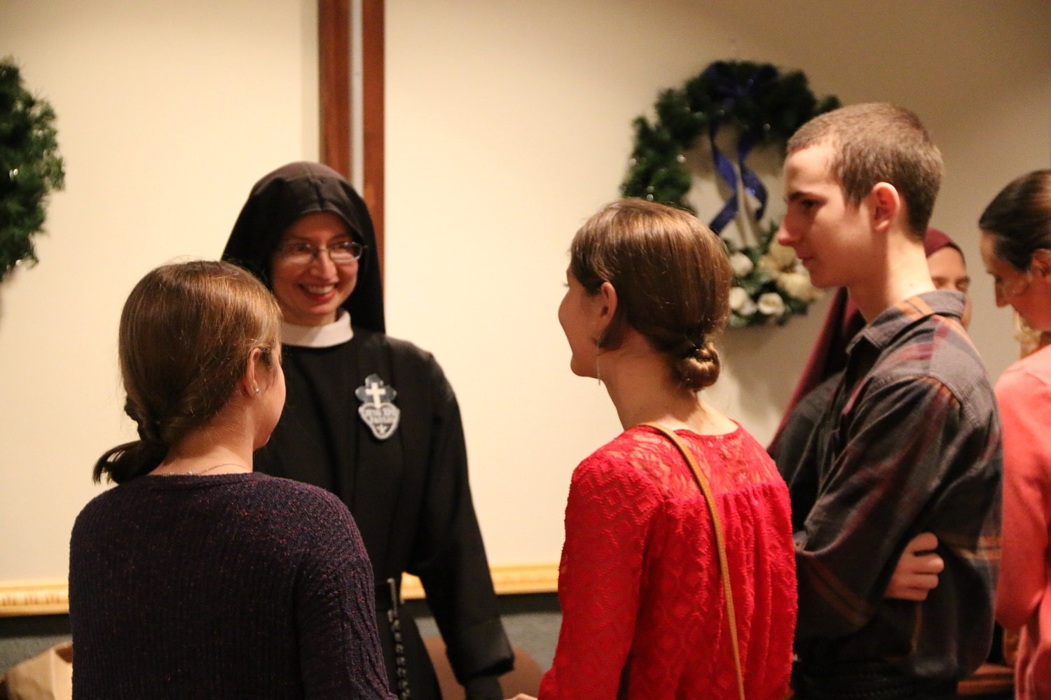  Sr. Cecilia Maria greets some young guests   (Photo: Elizabeth Wong Barnstead, Western KY Catholic)  