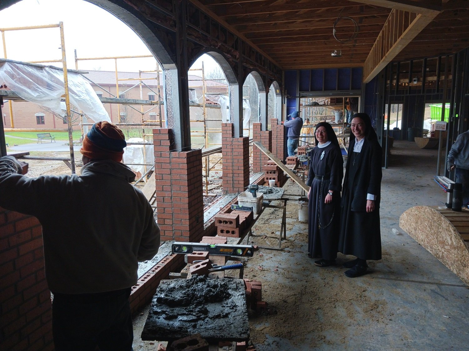  Sr. Frances Marie and then-Postulant Holly supervise some of the work 