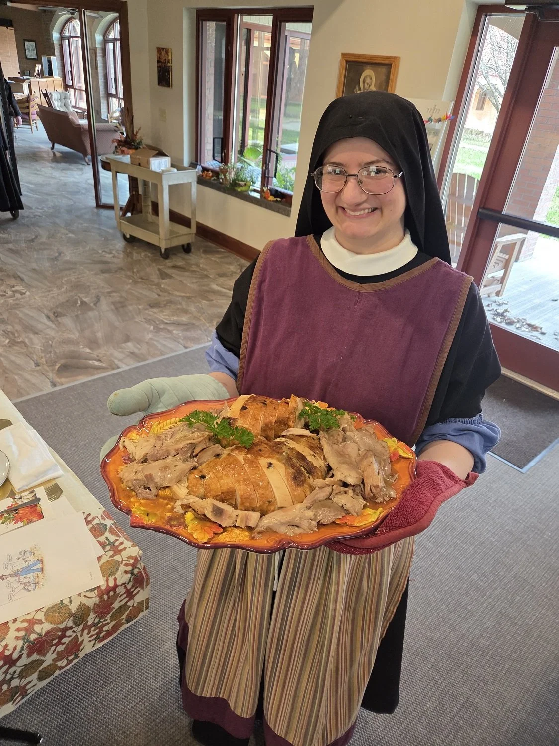  Sr. Miriam Esther brings out the main course! 
