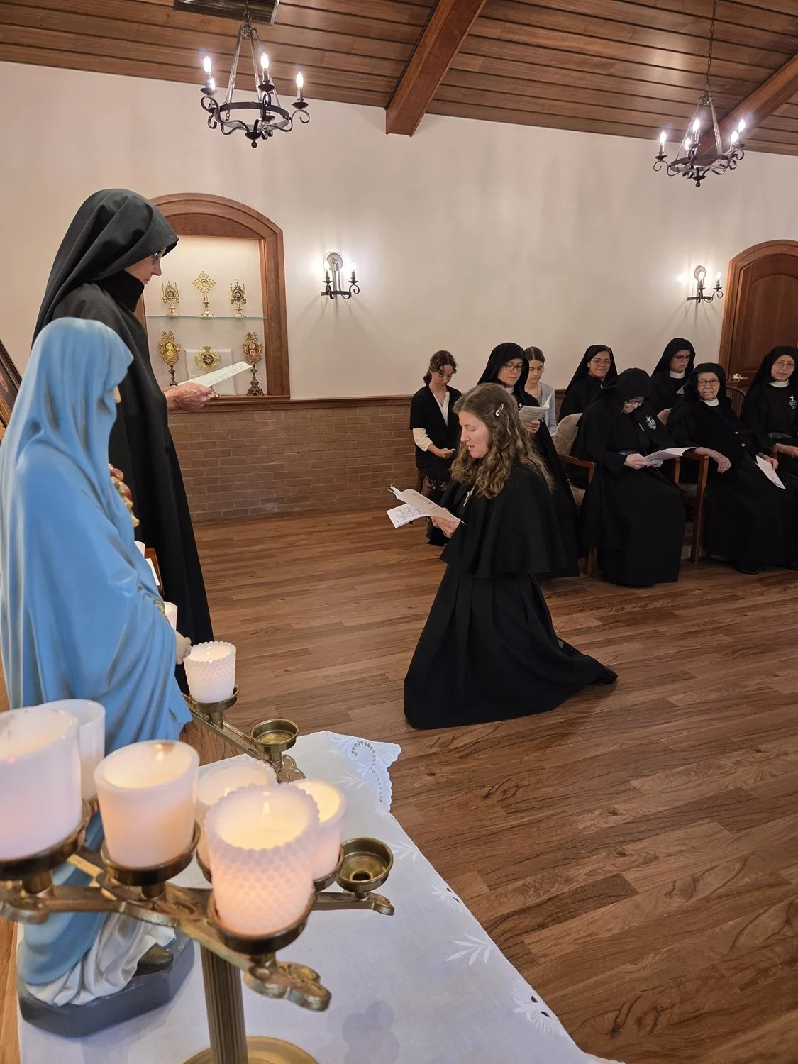  Collette kneels before Mother Mary Veronica to formally request entry into the novitiate 