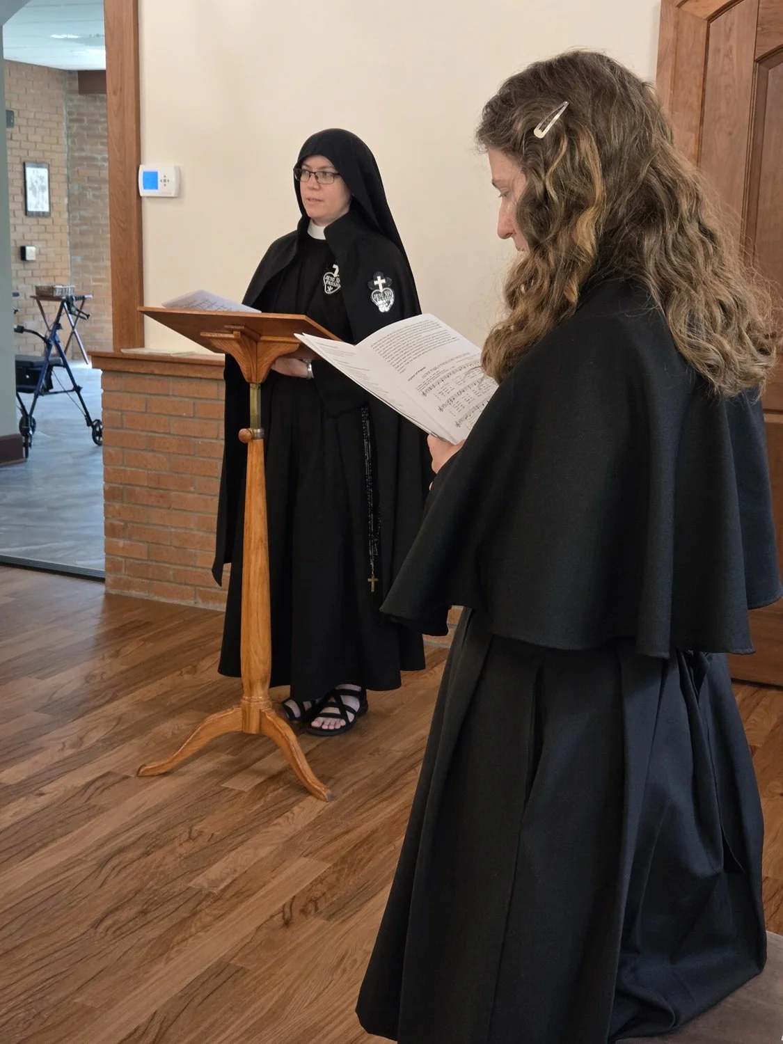  Sr. Maria Faustina, Novice Directress, proclaims the Gospel reading for the ceremony - John chapter 17 