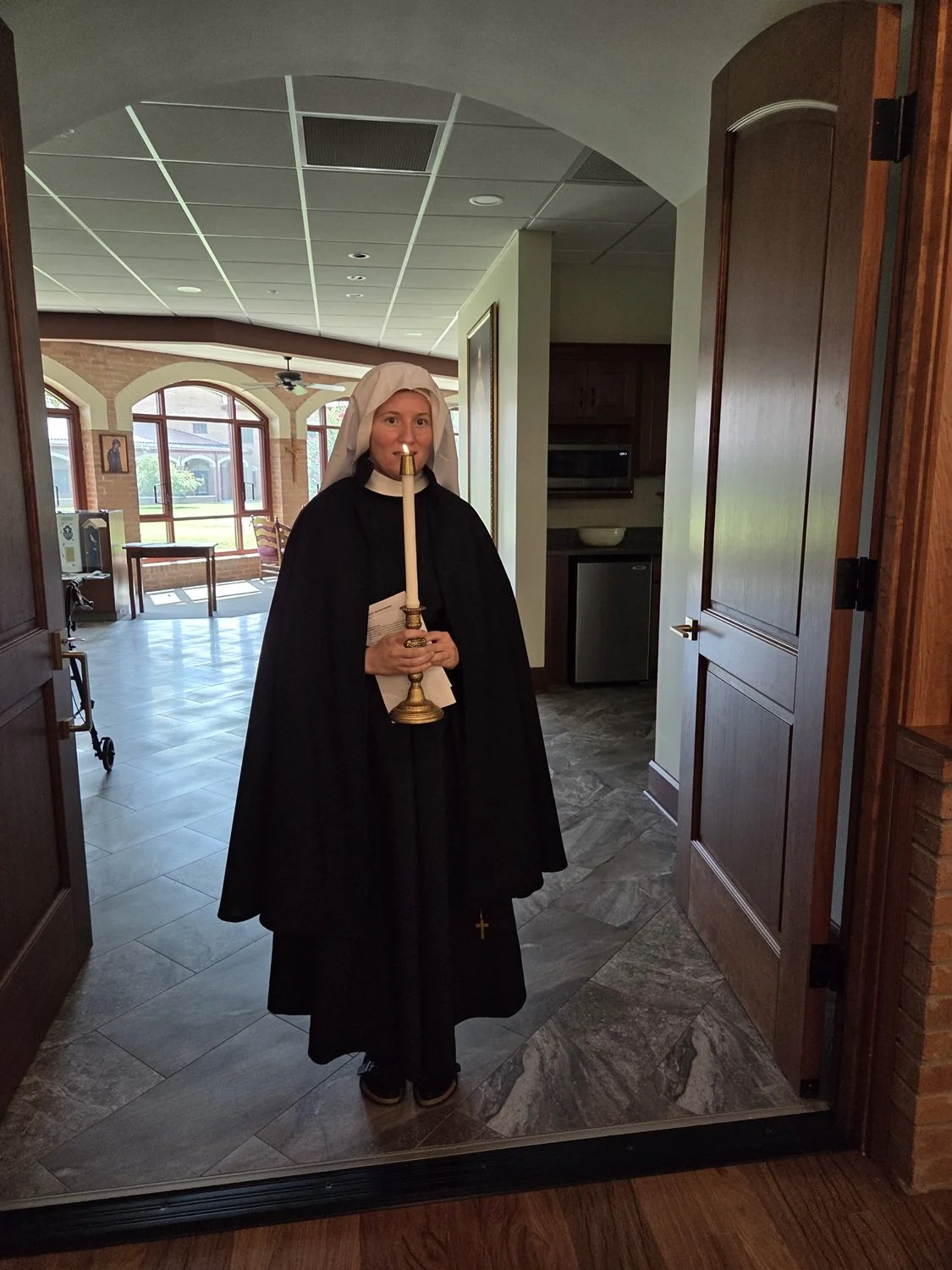  The first glimpse of our new novice: Sr. Maria Dolorosa of the Suffering Face of Jesus! 