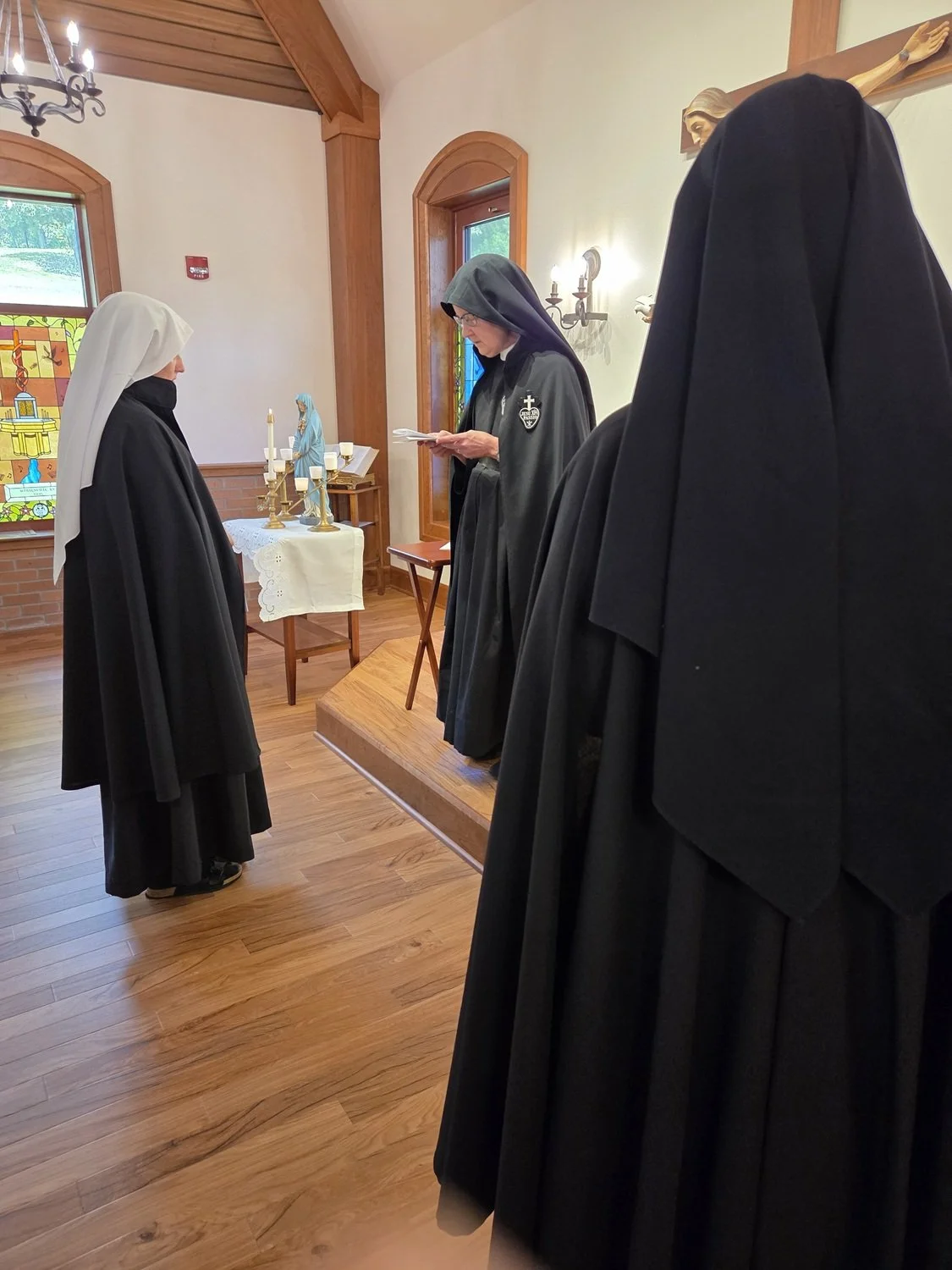  Sister formally receives her new religious name, signifying her special call from God to serve Him in the Passionist way of life 