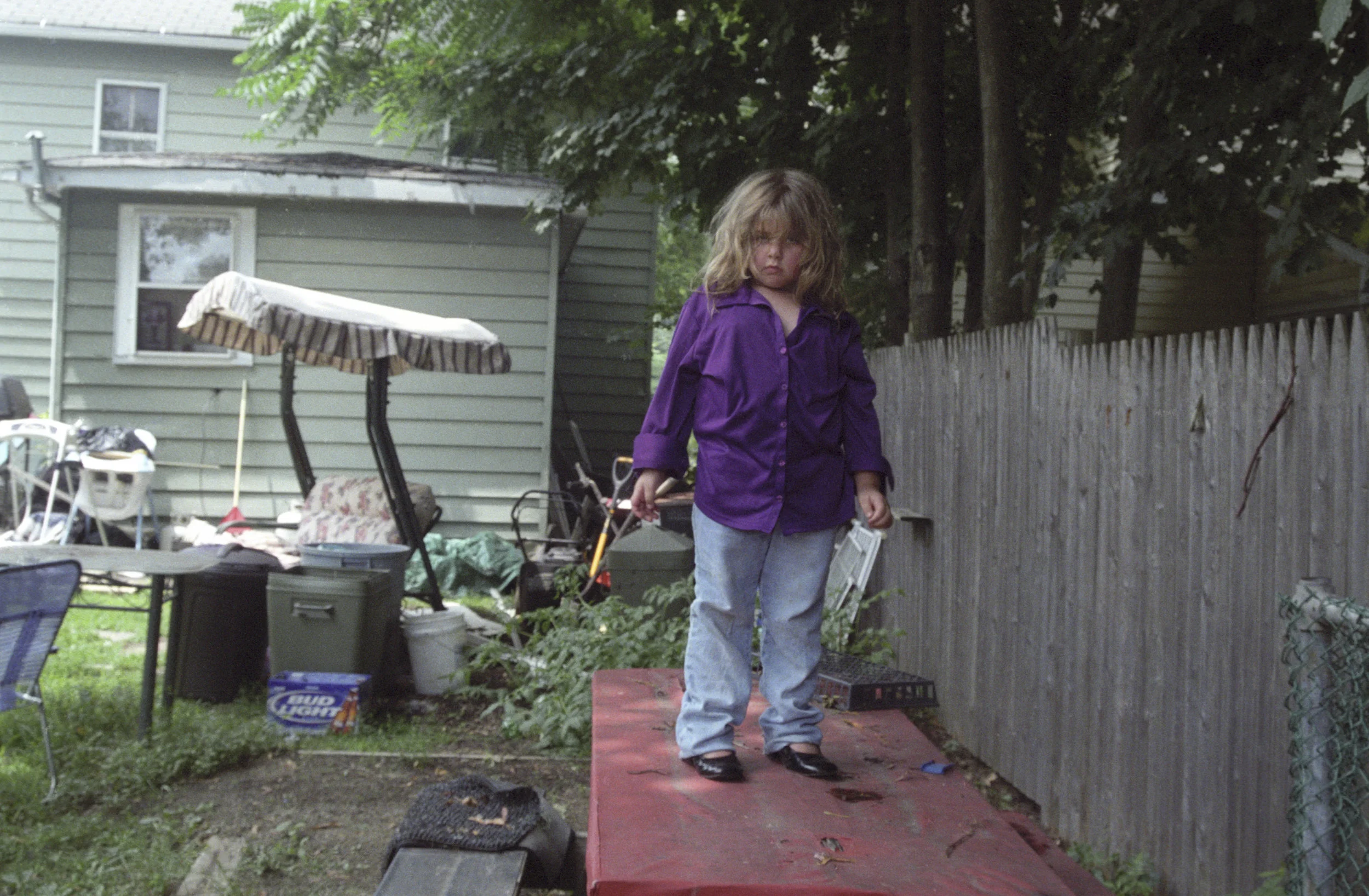 Anna standing on table backyard_blurb2.jpg