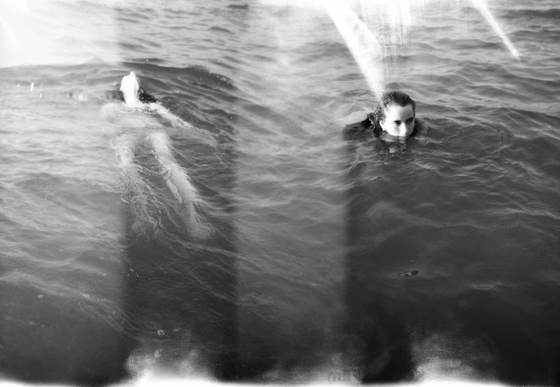 Heather_Musto_Girl floating in the water, Maine 2003.jpg