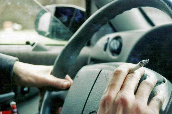 13. Dennis-hands-on-wheel, 2002.jpg