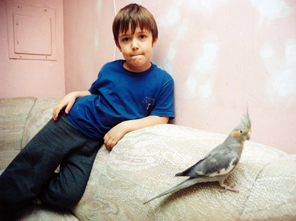 +18.Robert-next-to-bird-on-couch, web size copy.jpg