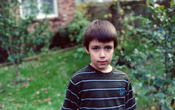14. Robert-in-front-yard-looking at me, web size copy.jpg