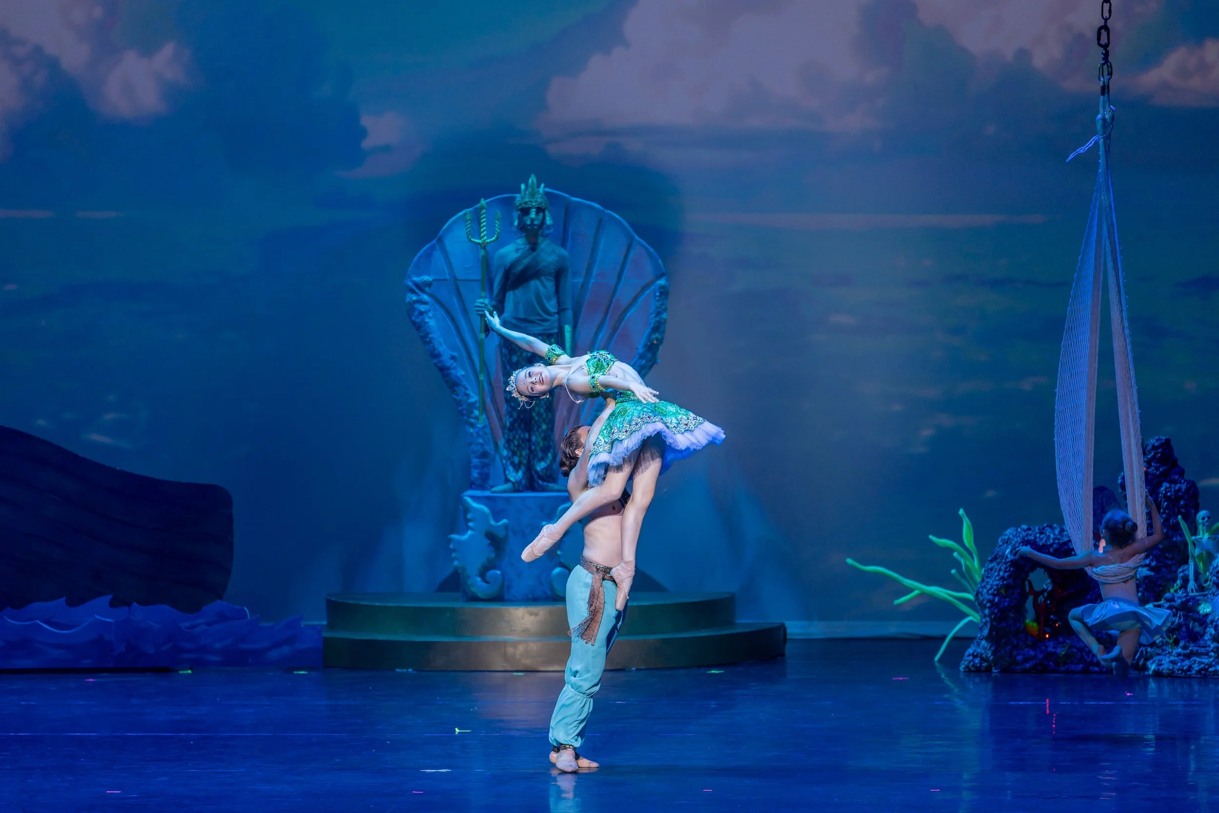 Dancers showcase technical precision and emotional expression during a featured ensemble number.