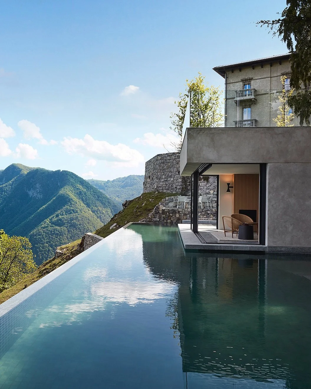 Perched high above Lake Como, this villa offers one of the best views in Europe and exclusive private retreat in Italy.
Originally built in 1909 on the site of a medieval watchtower, the 8 bedroom villa combines timeless architecture with modern des