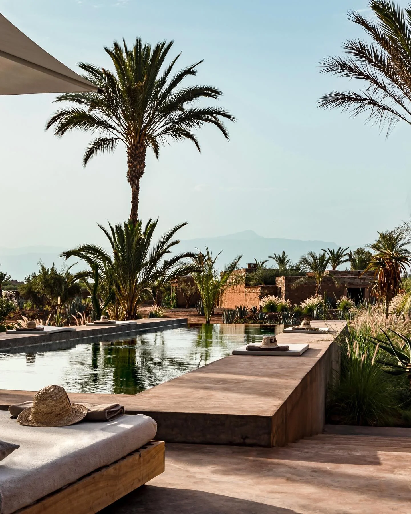 Just a few miles beyond Marakkech&rsquo;s maze of a Medina, Villa Orche sits amid six hectares of beautiful gardens and sun-dried land. With&nbsp;ochre-hued adobe walls, steel-accented interiors, Berber rugs, and leather furnishings, across 10 beauti