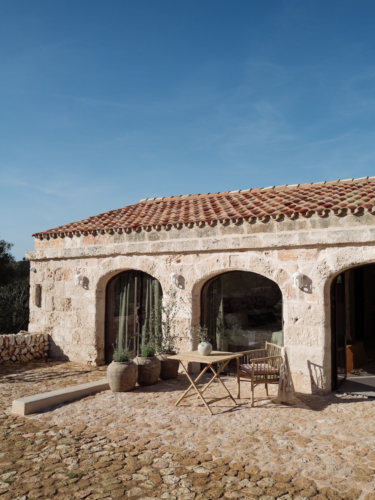 Welcome to Santa Sofia, our exquisite and elegantly renovated 6 bedroom Menorcan farmhouse, positioned at the heart of a wonderfully private and secluded 210 hectare estate offering tranquillity to groups of friends and families. Surrounded by fragra