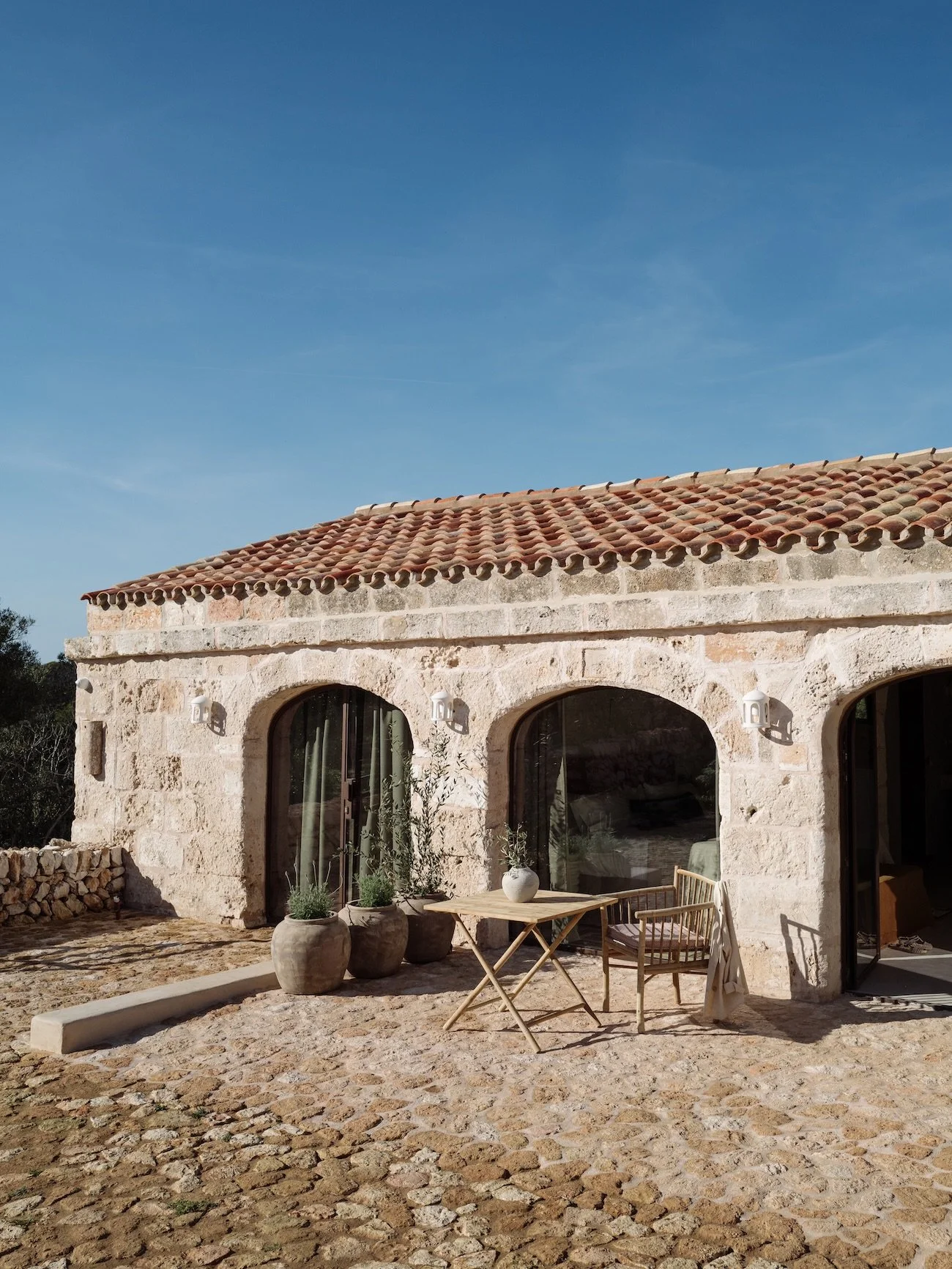 Welcome to Santa Sofia, our exquisite and elegantly renovated 6 bedroom Menorcan farmhouse, positioned at the heart of a wonderfully private and secluded 210 hectare estate offering tranquillity to groups of friends and families. Surrounded by fragra