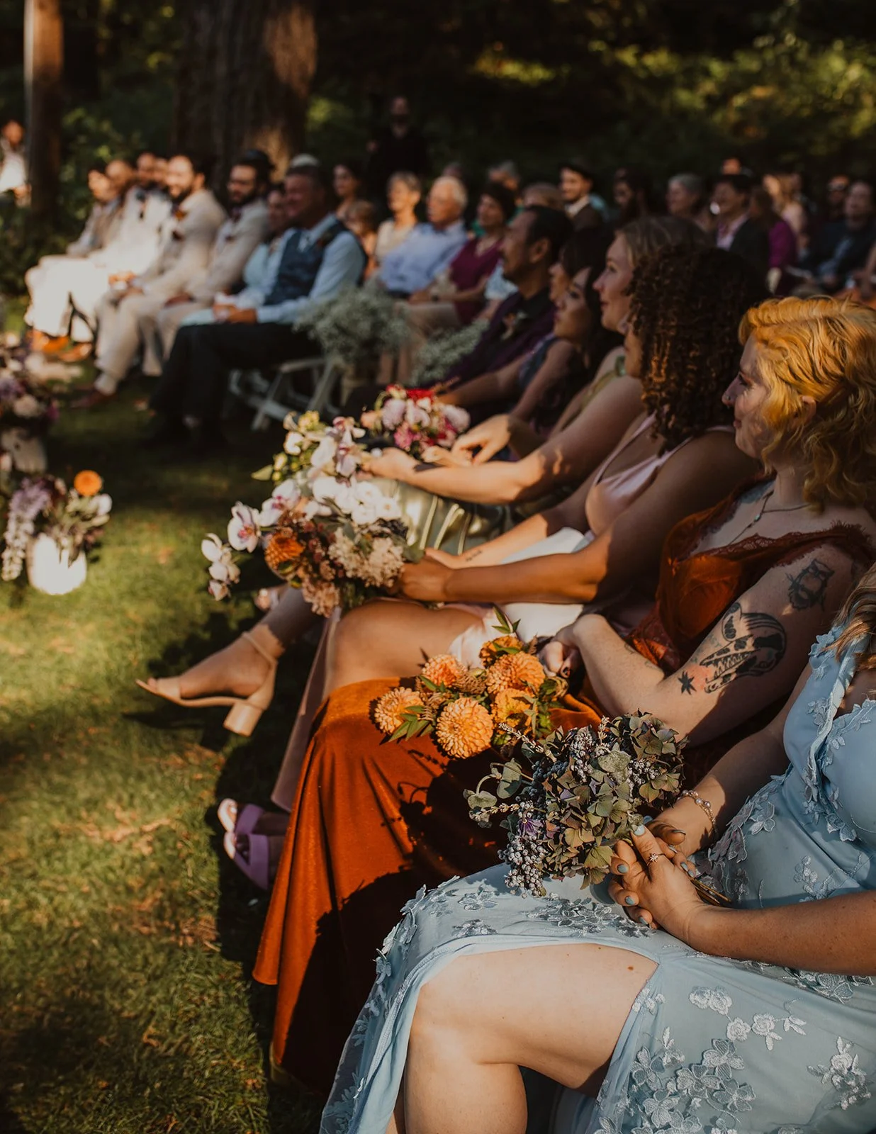 Wedding guests watching the ceremony during a Bridal Veil Lakes wedding in the Columbia River Gorge.