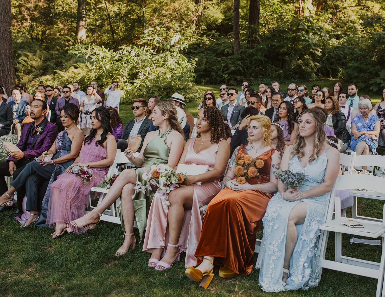 Wedding guests watching the ceremony during a Bridal Veil Lakes wedding in the Columbia River Gorge.