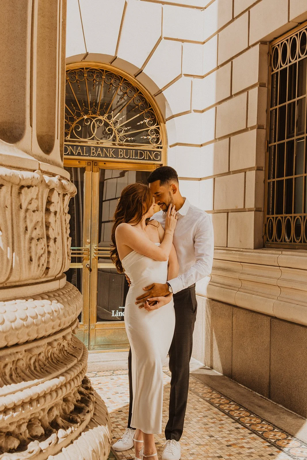 Couple dressed up for a downtown Portland engagement session