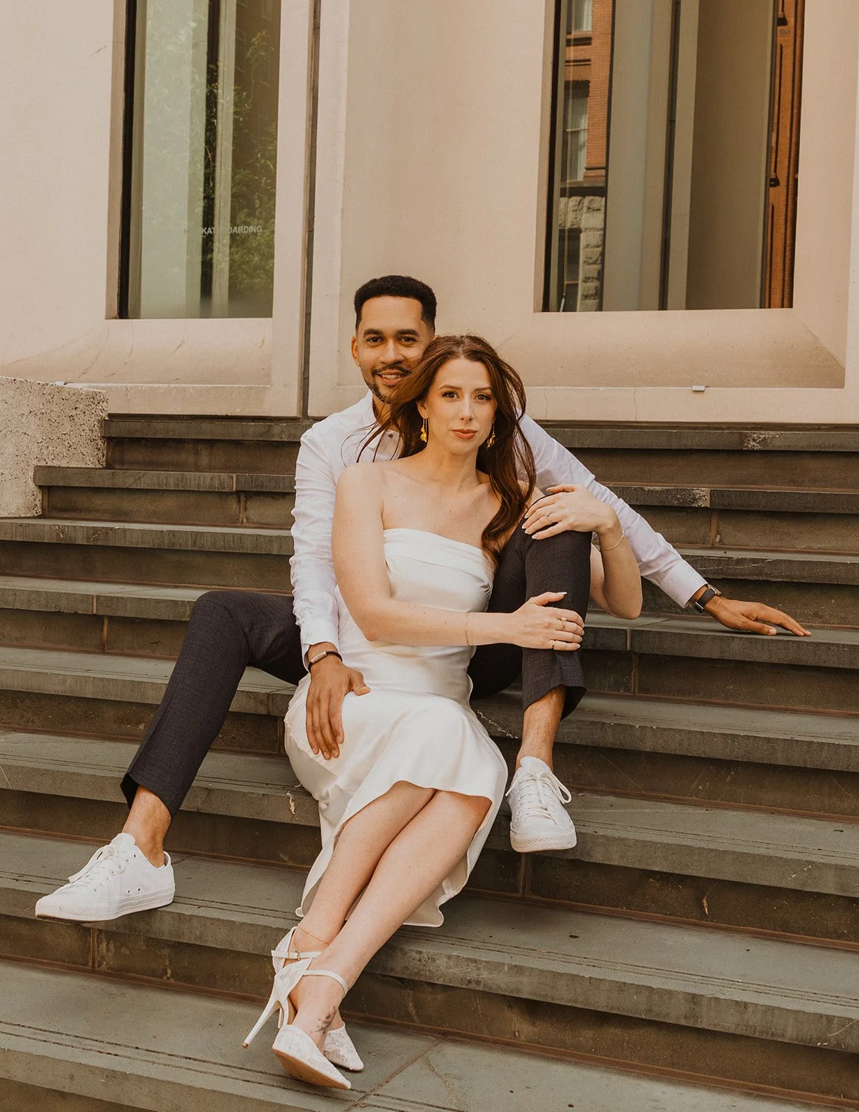 Candid moment between Charlotte and Lucas during their downtown Portland engagement session