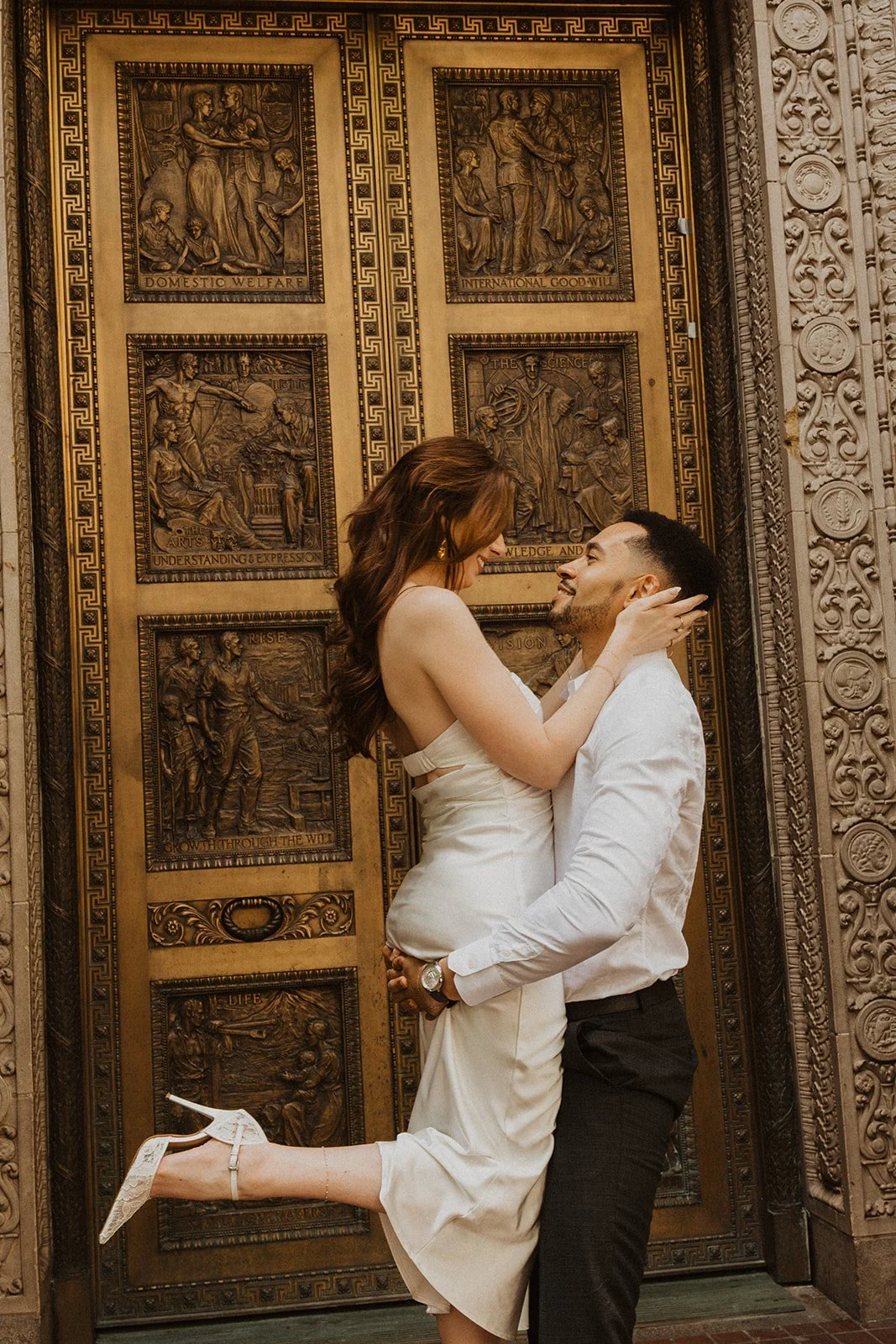 Couple sharing a romantic moment during their Portland engagement photos
