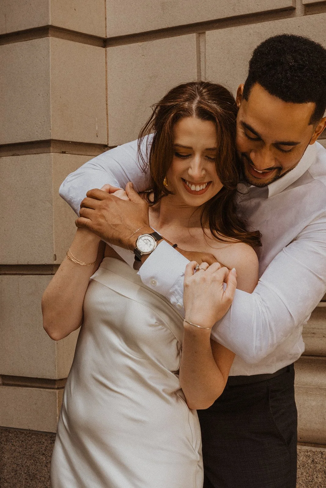 Documentary-style engagement portrait of Charlotte and Lucas in Portland, Oregon