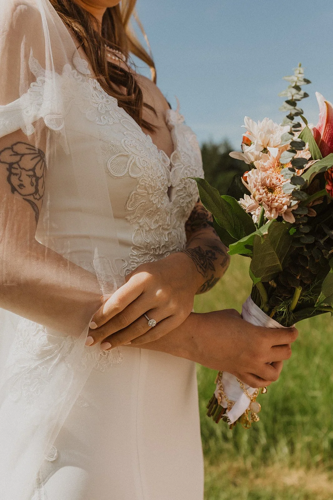 Heirloom jewelry and bridal bouquet among the wedding day details