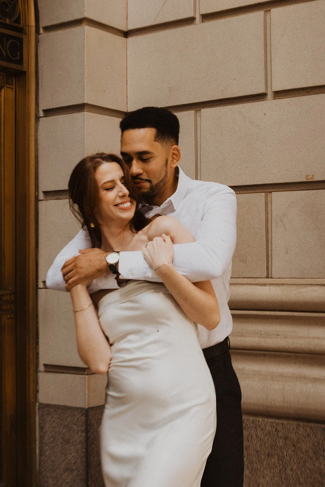 Engagement session in Portland with the couple walking and talking downtown
