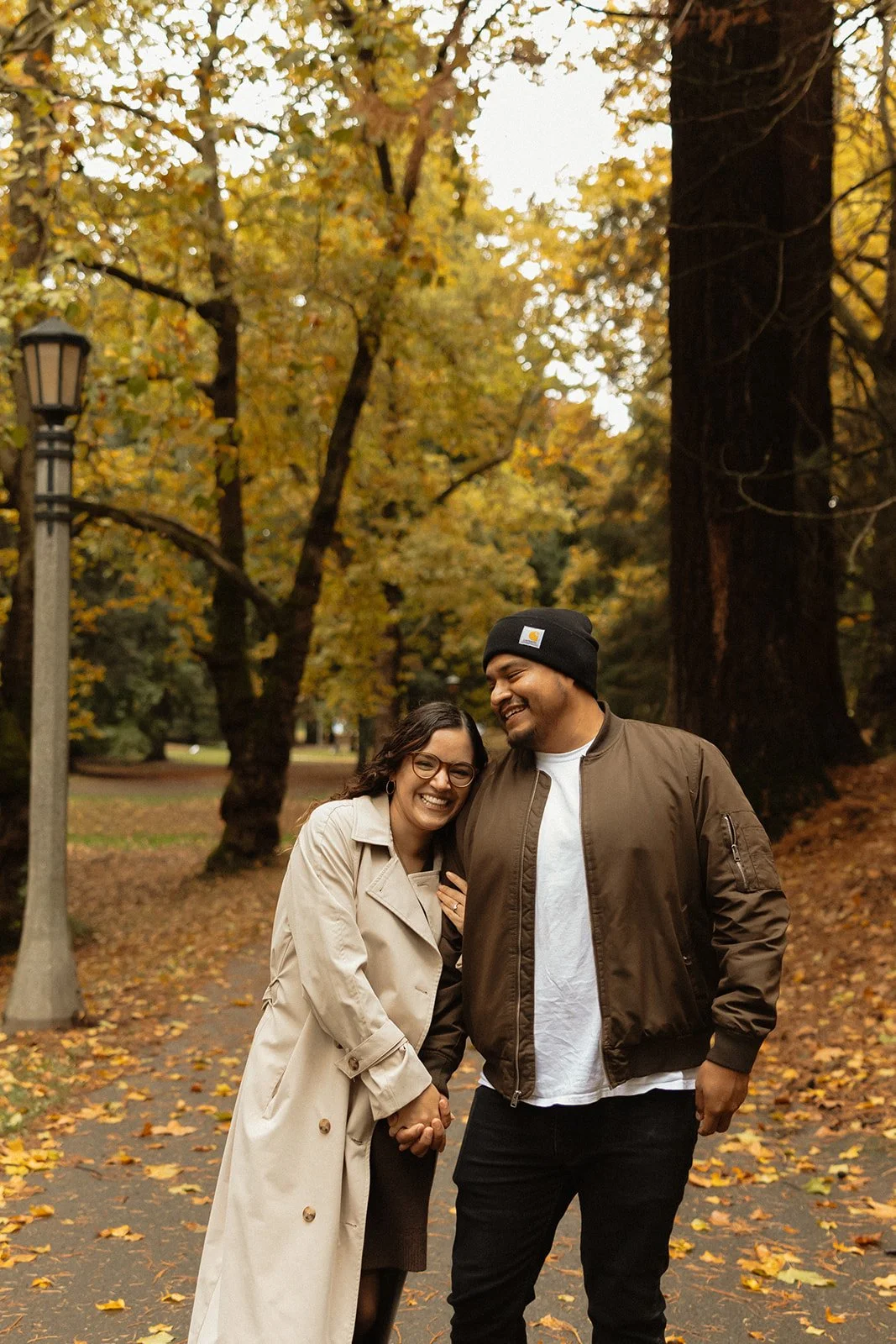 Foreheads together under a heavy gray Portland sky in October