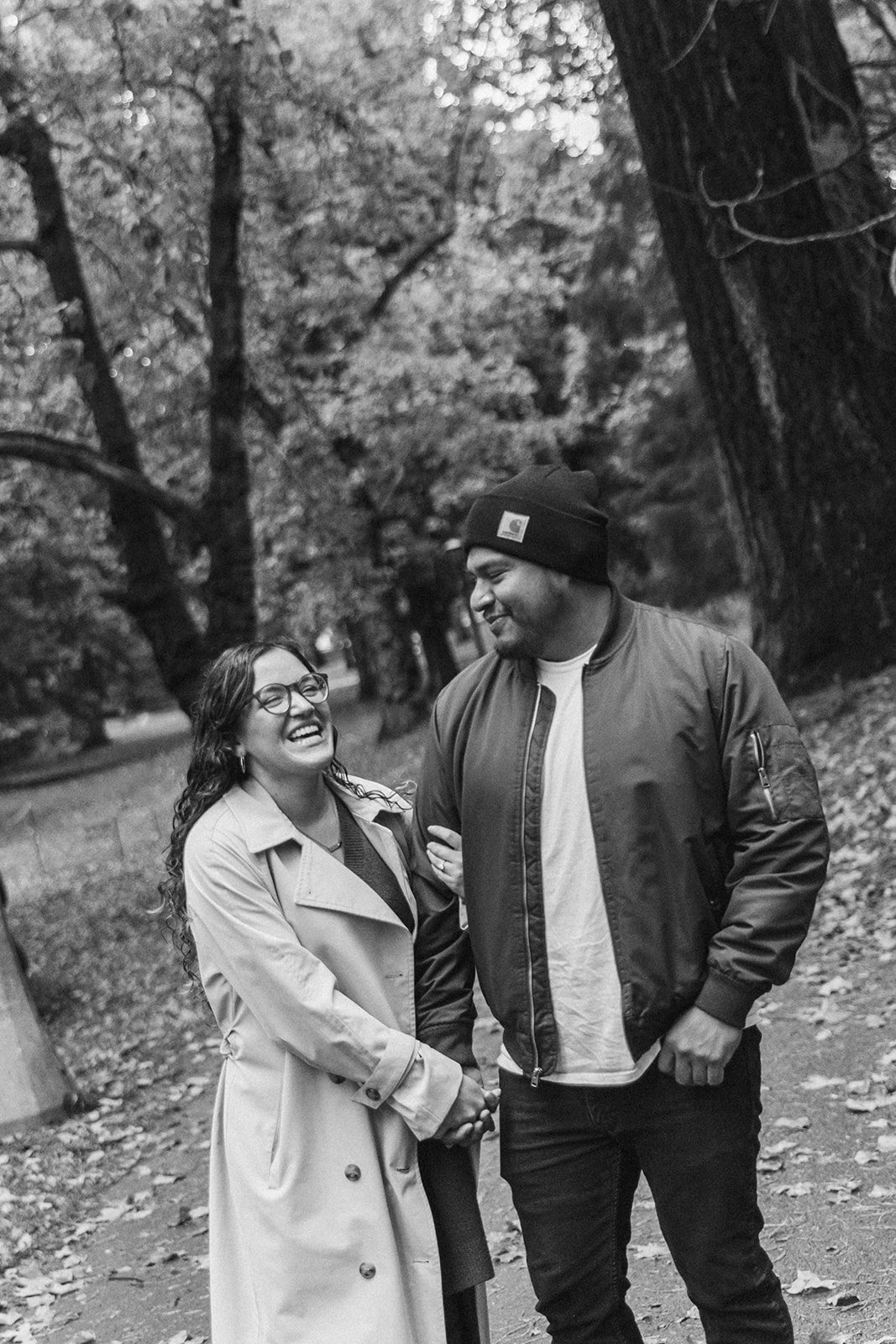 Couple stopped mid-path in a Portland park because the light looked good