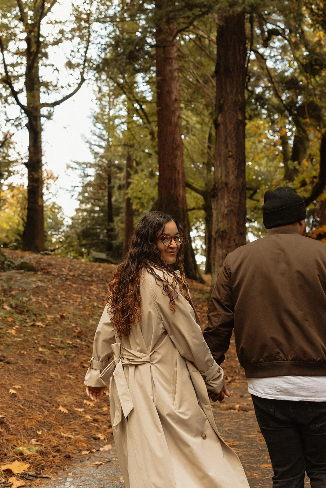 Tree line at Laurelhurst Park framing a couple in October