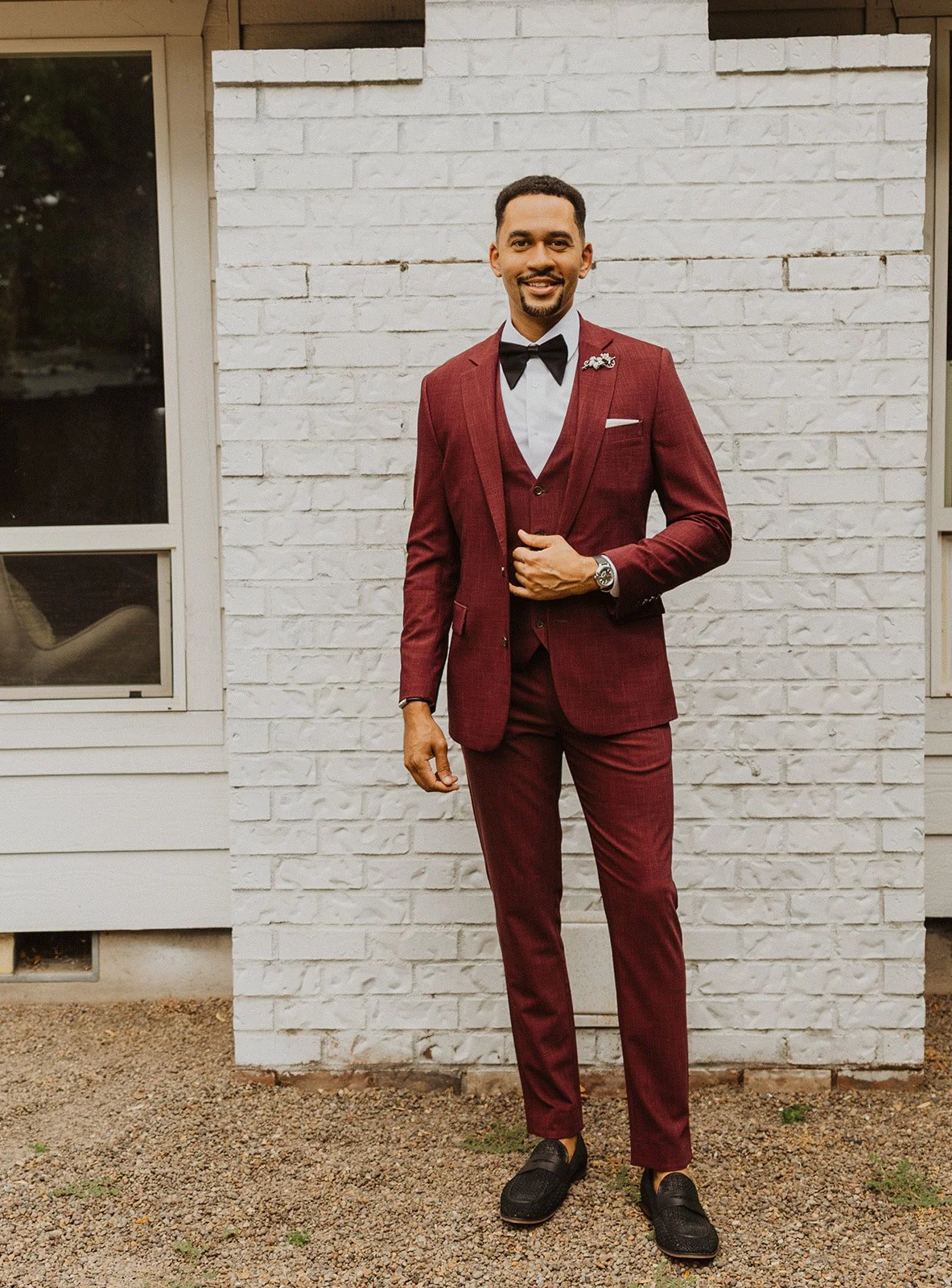 Groom portrait in a burgundy three-piece suit at a Willamette Valley wedding