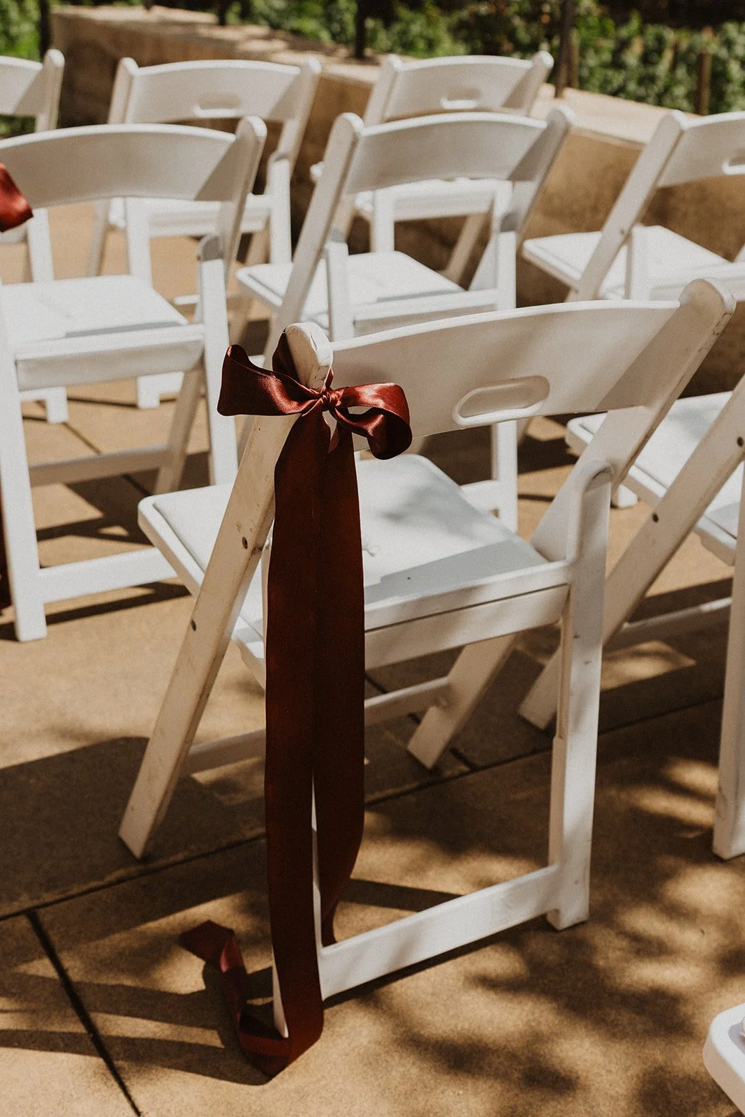 Outdoor Oregon winery wedding ceremony set facing the valley
