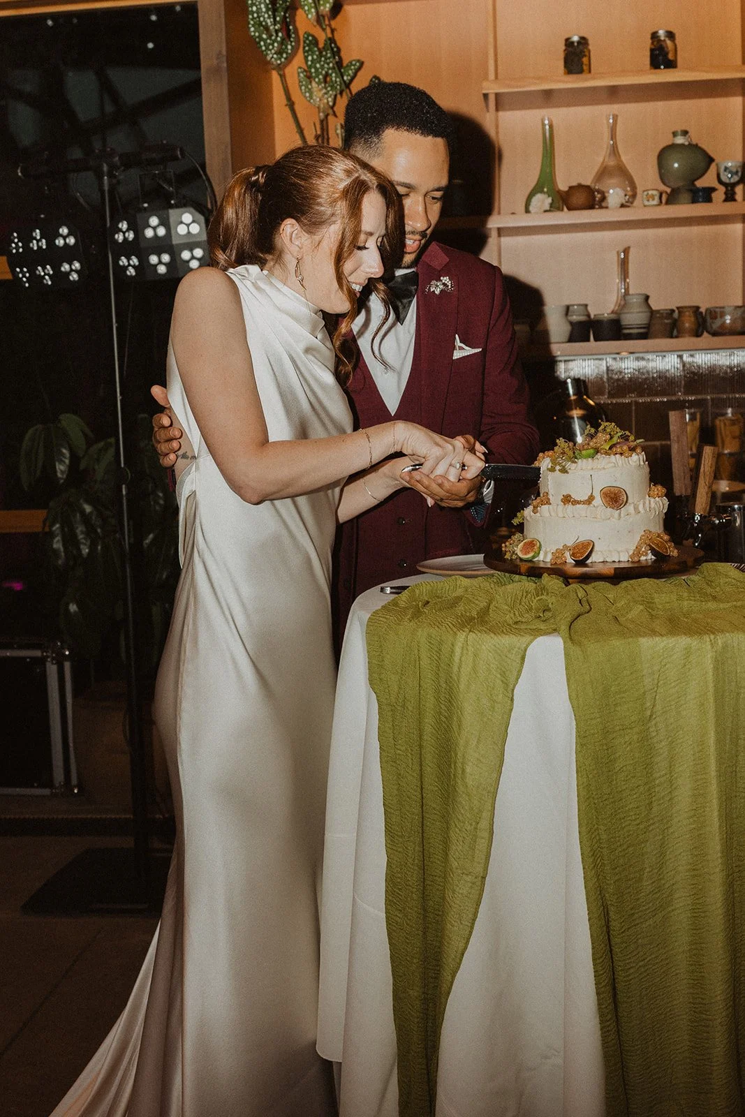 Cutting the cake inside the tasting room later in the evening