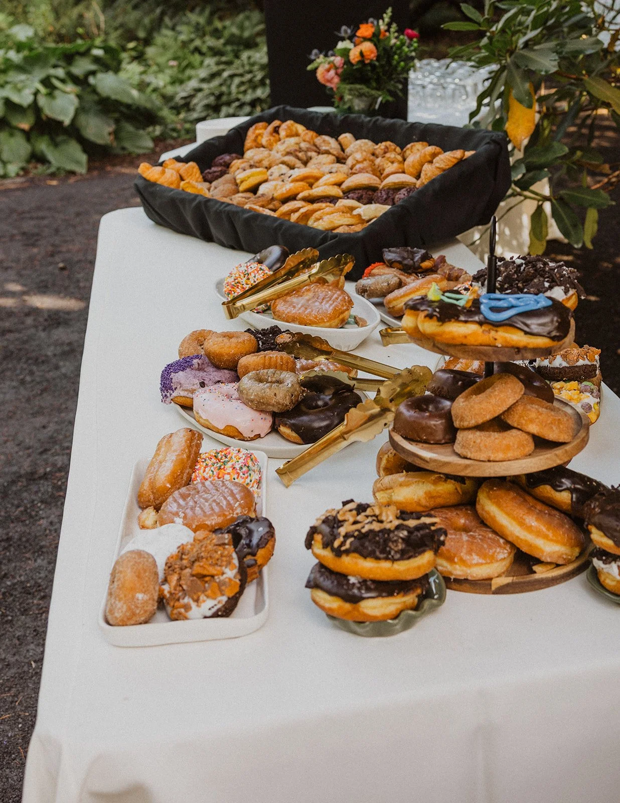 Donut spread on tiered stands at a Crystal Springs Rhododendron Garden wedding