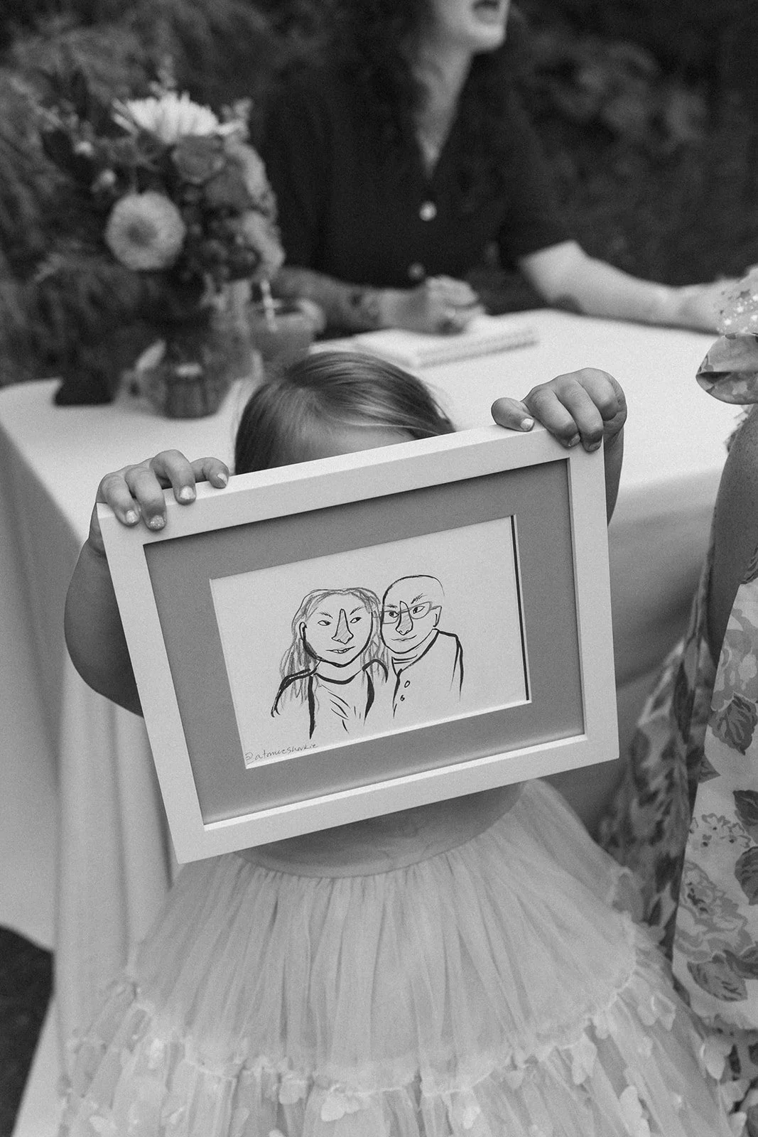 Finished ink illustration handed to a guest to take home from the wedding
