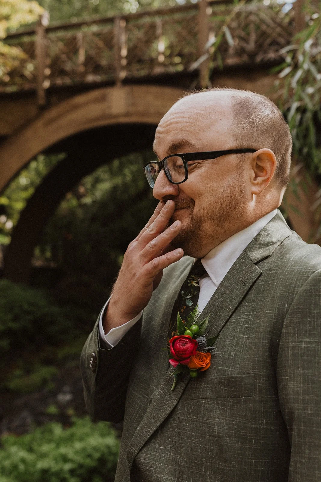 First look reaction under the arched bridge at a Crystal Springs wedding