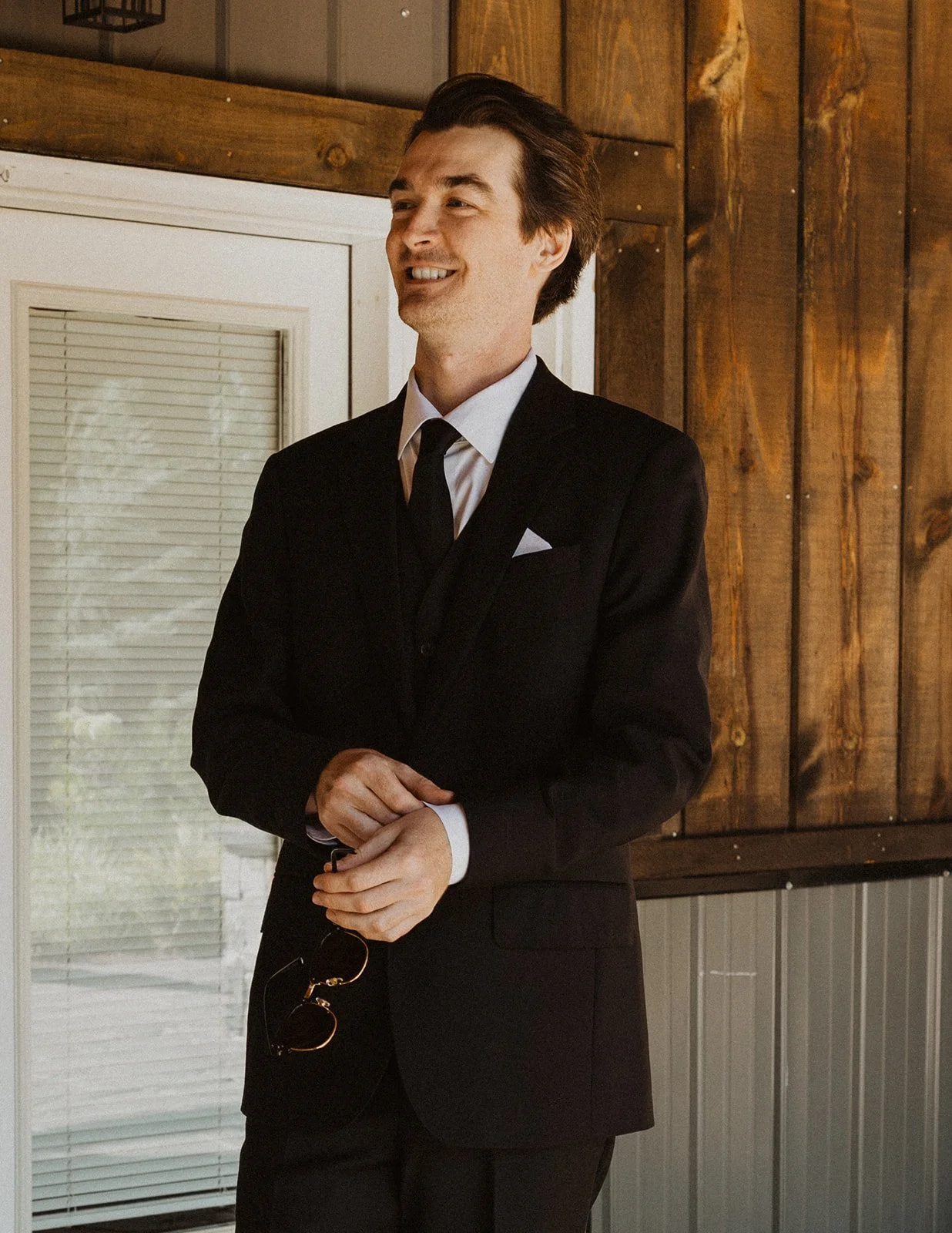 Waiting on the covered porch before a Rocky Hill wedding ceremony starts