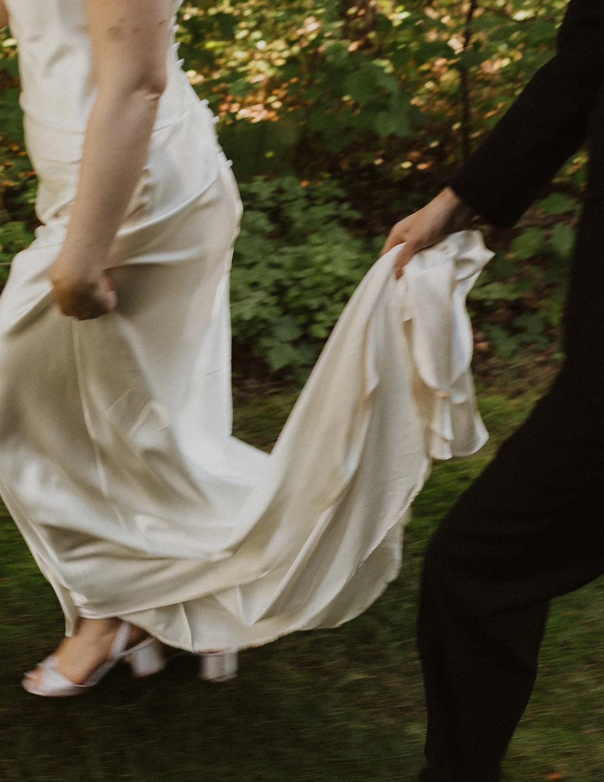 Carrying the train across the grass between portraits and dinner
