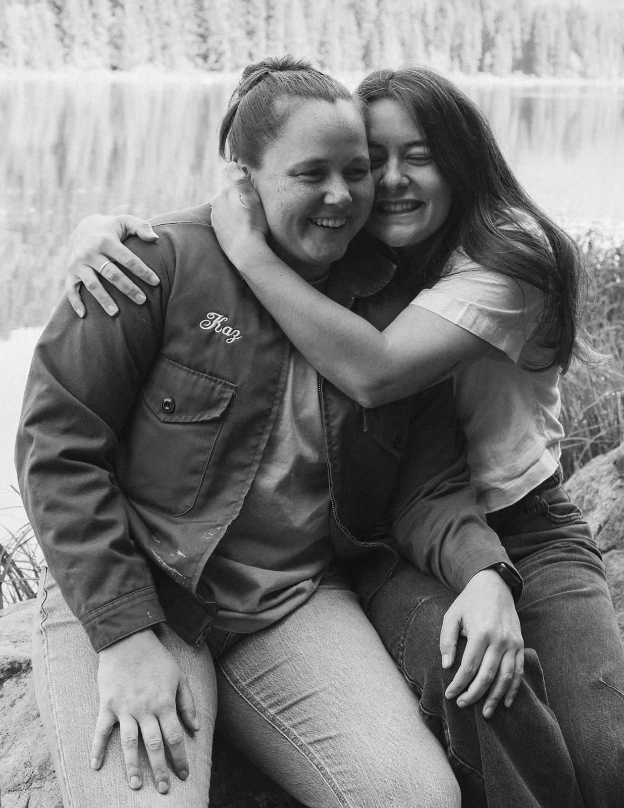 Laughing on a rock at the edge of Trillium Lake after getting engaged
