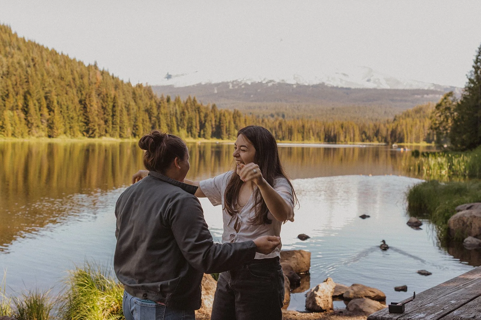 Hands up and laughing in the first minute of a Trillium Lake engagement