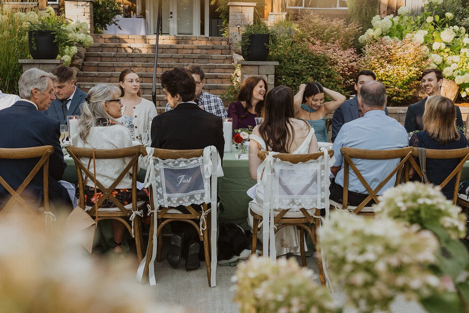 Dinner running long at the single reception table at a Rocky Hill wedding